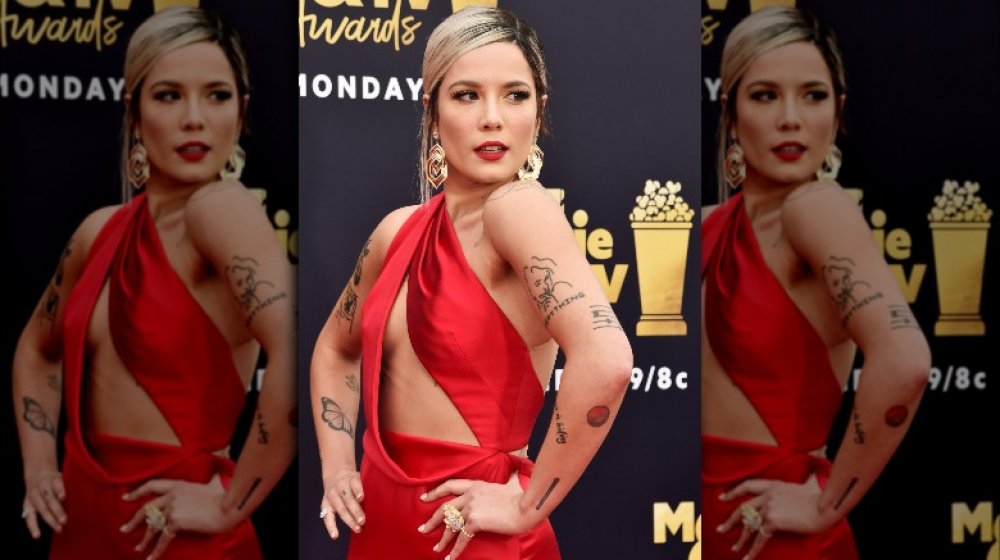 Halsey in a revealing red dress