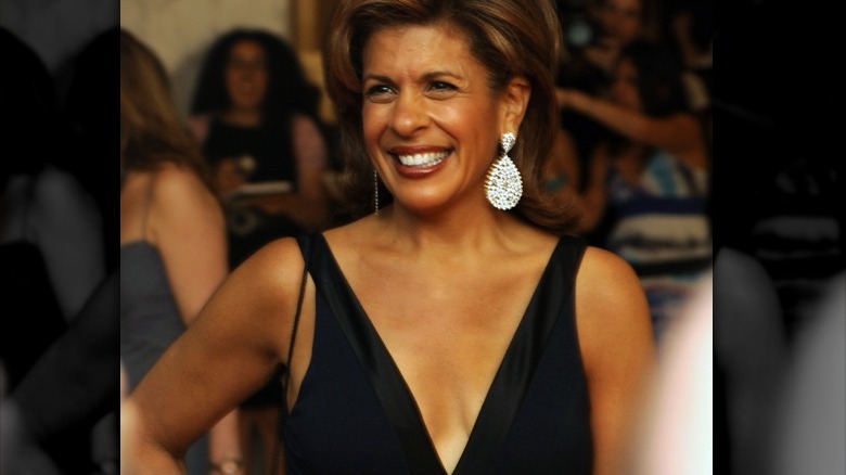 Hoda Kotb smiling in plunging dress