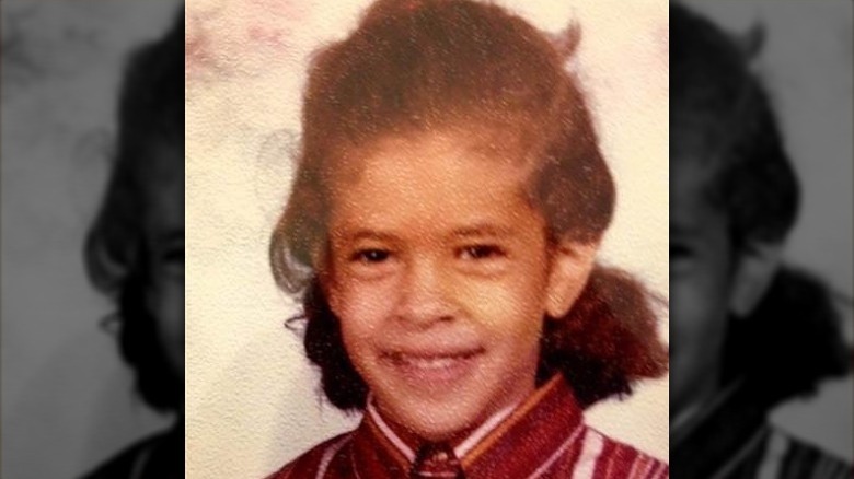 Hoda Kotb as a smiling child