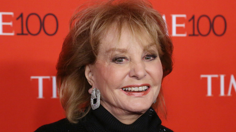 Barbara Walters posing at an event