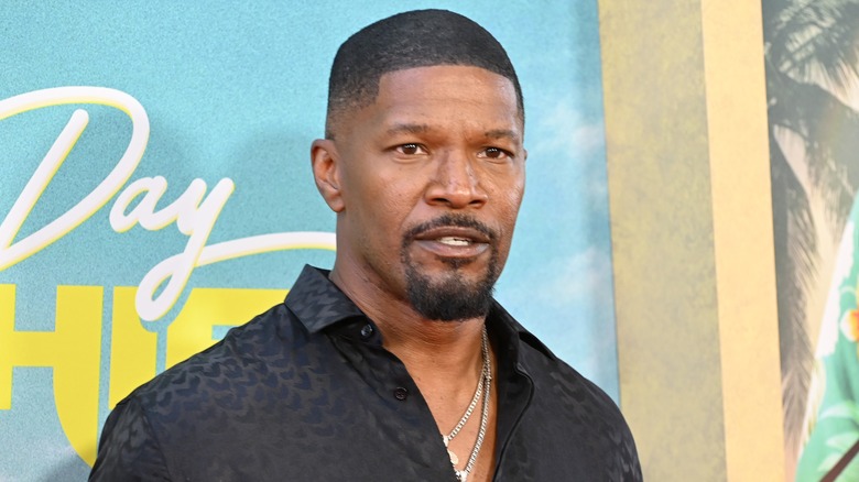 Jamie Foxx posing on a red carpet