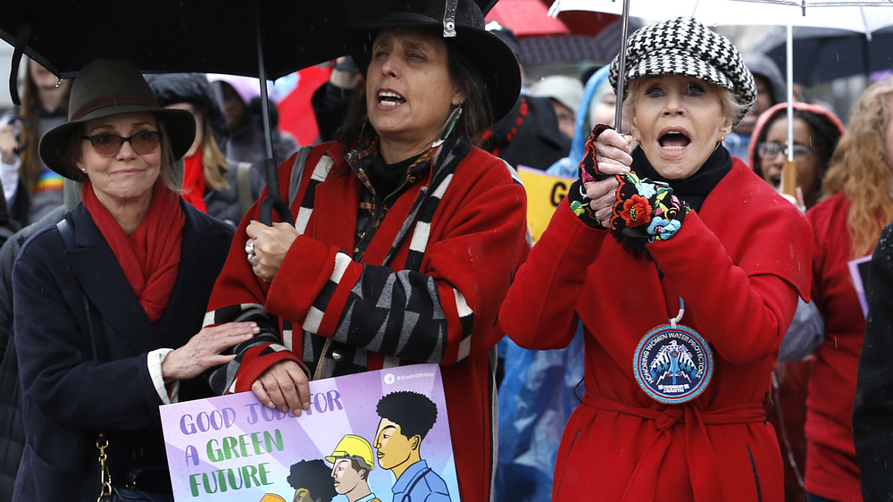 Sally Field, Winona LaDuke, and Jane Fonda protesting