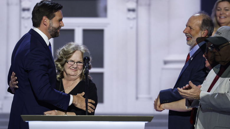 JD Vance hugging his mom at the 2024 RNC while people watch