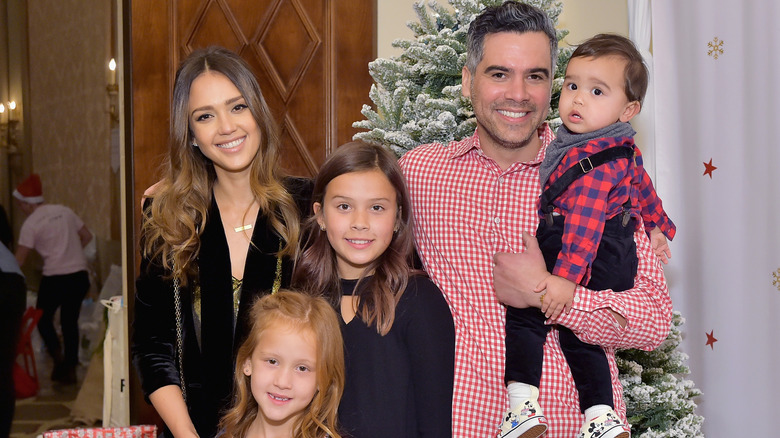 Jessica Alba and her family, posing together