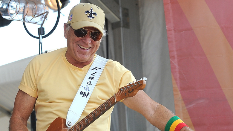 Jimmy Buffett wearing Saints hat