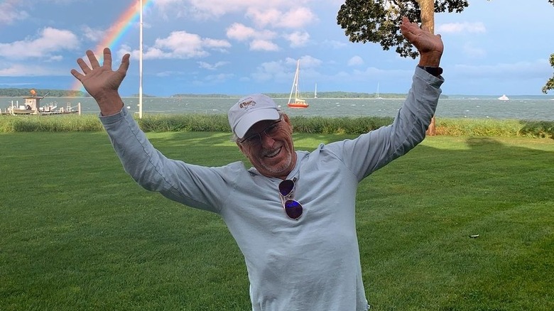 Jimmy Buffett with rainbow in background