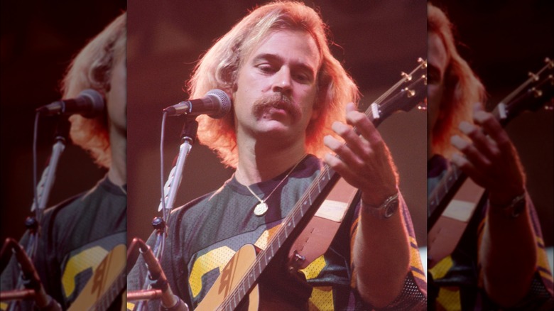 Jimmy Buffett playing guitar