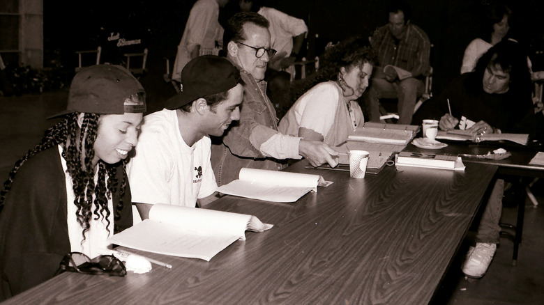 Joe Rogan and Phil Hartman at NewsRadio table read