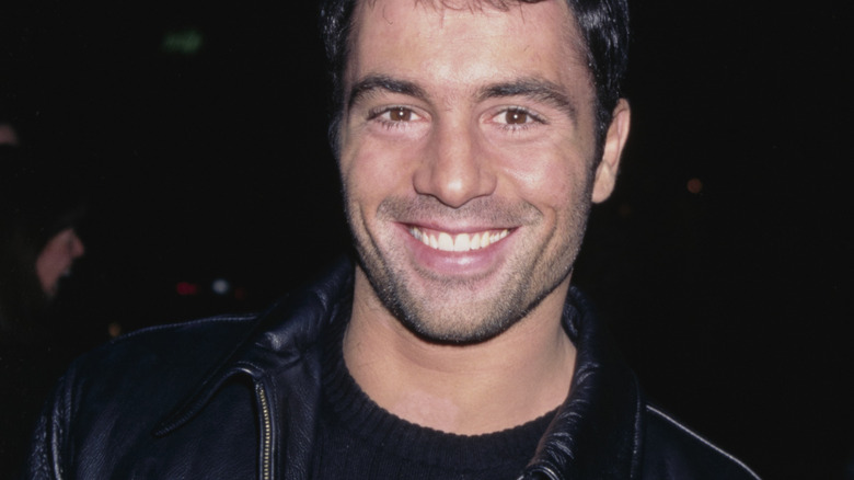 Young Joe Rogan smiling