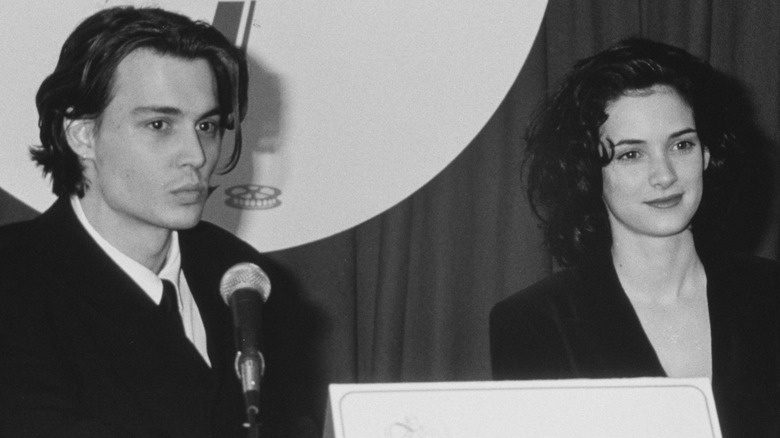 Johnny Depp and Winona Ryder at a press event 