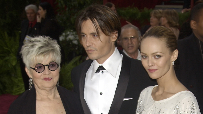 Betty Sue Palmer, Johnny Depp, and Vanessa Paradis posing together