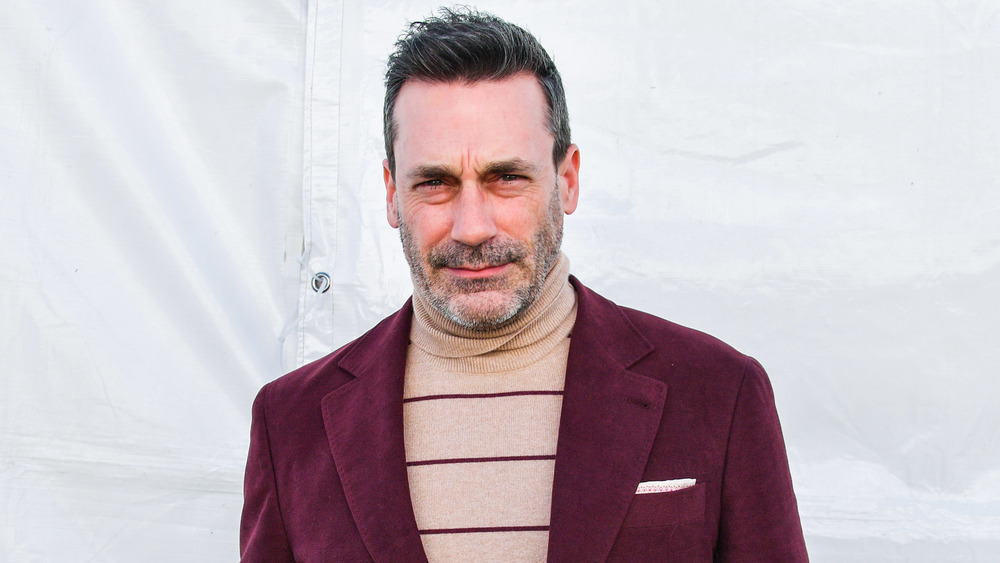 Jon Hamm with a slight smile 