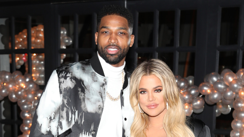 Tristan Thompson and Khloé Kardashian smiling