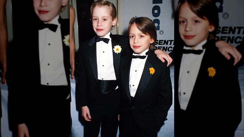 Macaulay and Kieran Culkin as kids wearing tuxedos