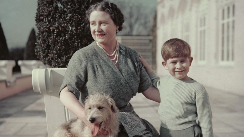 Young Prince Charles smiling with Queen Mother