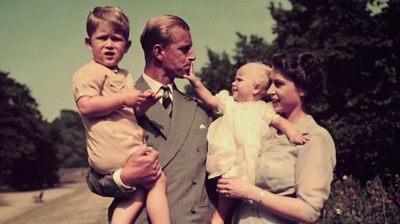 Young King Charles with Prince Philip and Queen Elizabeth II