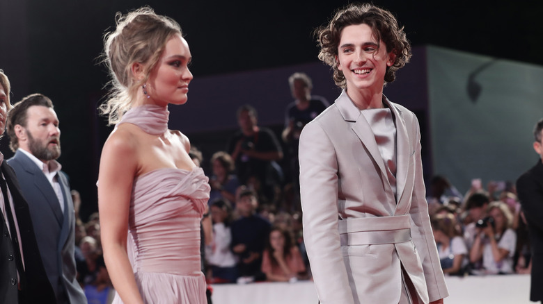 Lily-Rose Depp and Timothee Chalamet smiling