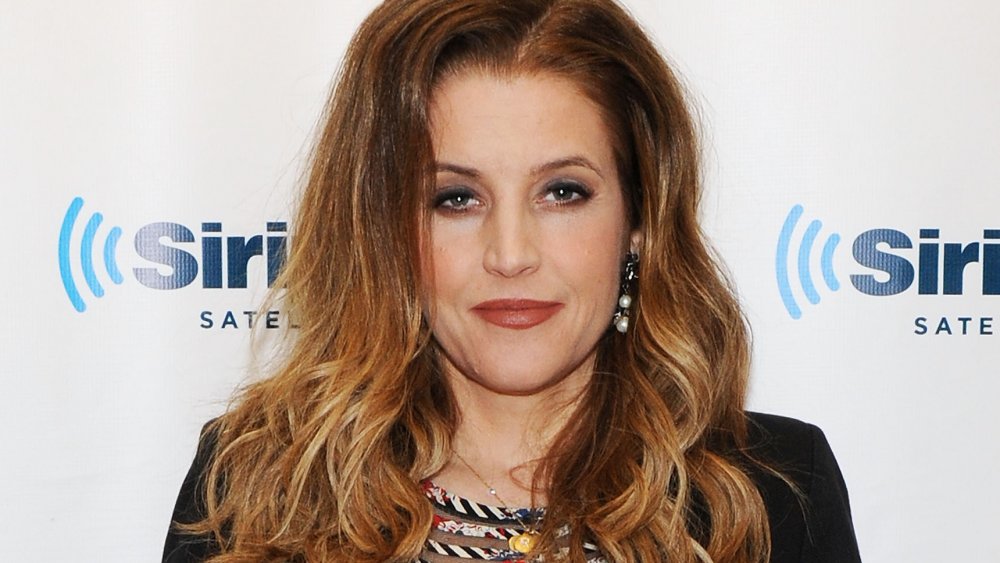 Lisa Marie Presley in front of SIriusXM wall