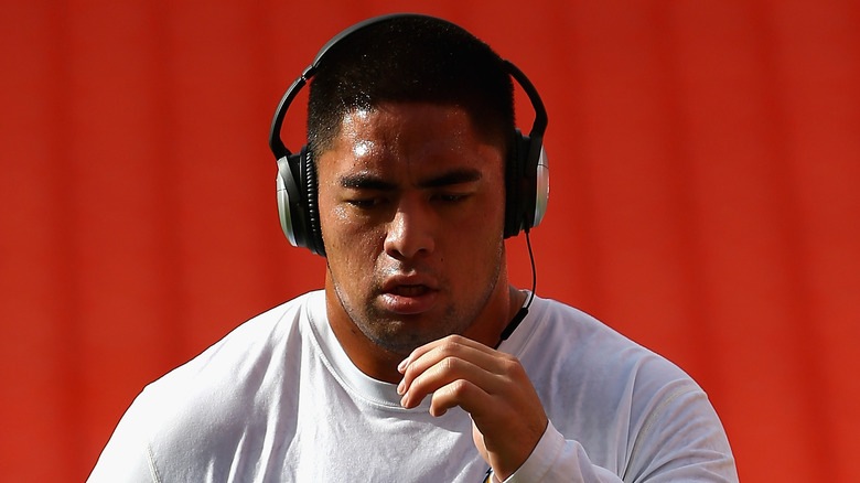 Manti Te'o wearing headphones