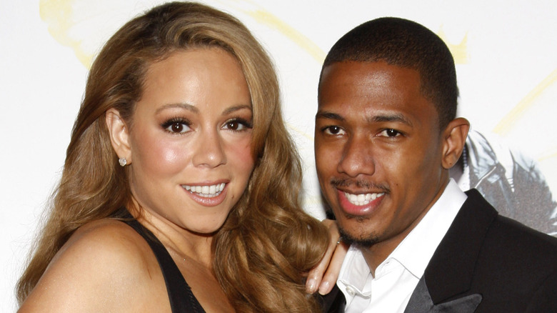 Mariah Carey and Nick Cannon posing