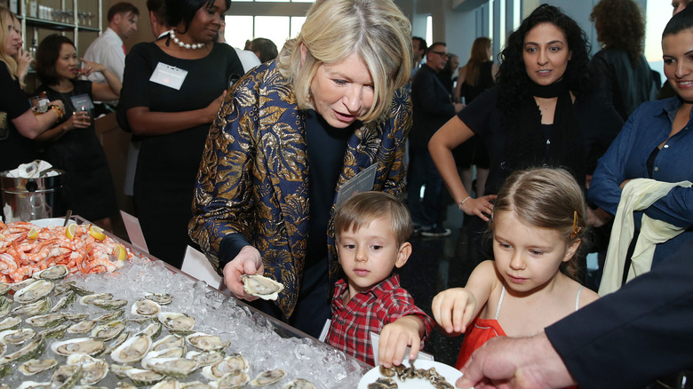 Martha Stewart eats oyster with grandkids