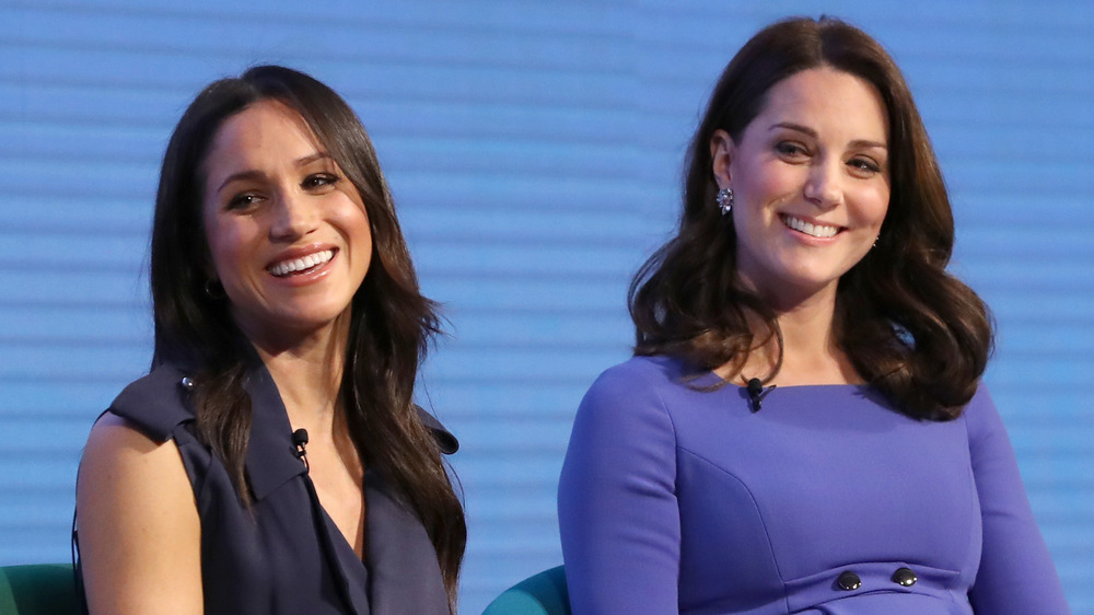 Meghan Markle and Kate Middleton both laughing