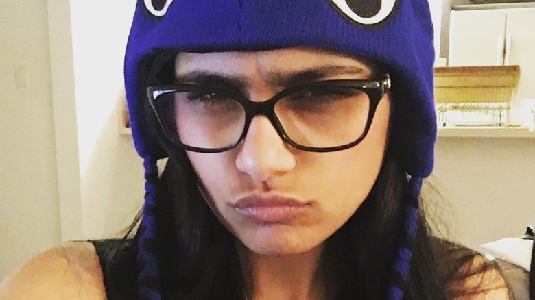 Mia Khalifa scowl glasses hat