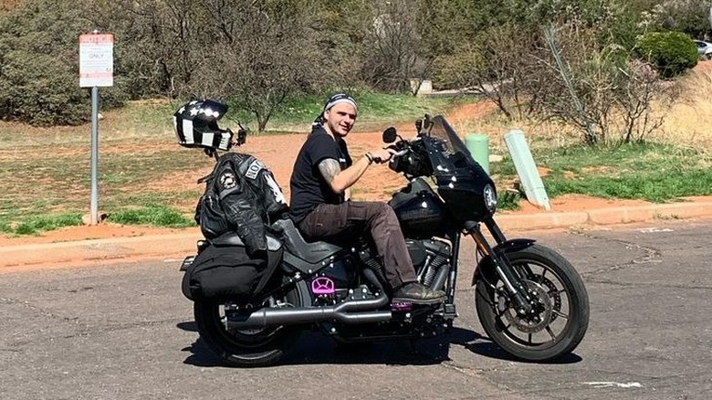 Prince Jackson sitting on a motorcycle