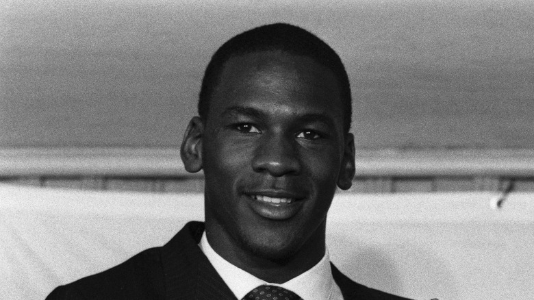 Michael Jordan black and white photo in suit