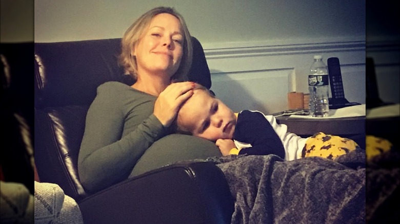 Pregnant Dylan Dreyer cuddling her firstborn