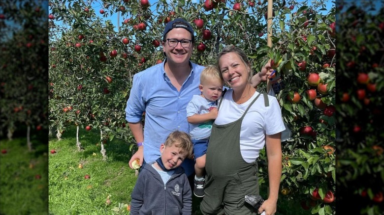 Pregnant Dylan Dreyer poses with her family at an apple orchard