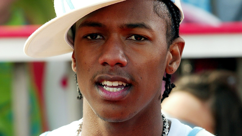 Nick Cannon wearing his cap to the side