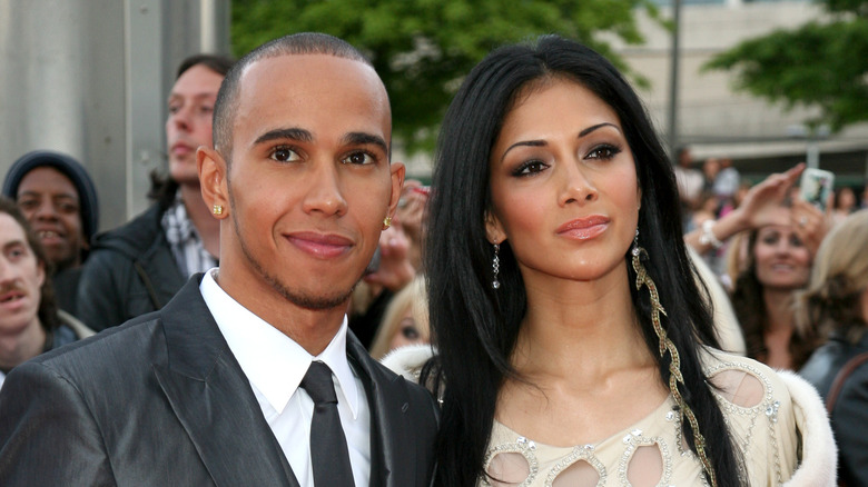 Lewis Hamilton and Nicole Scherzinger smiling