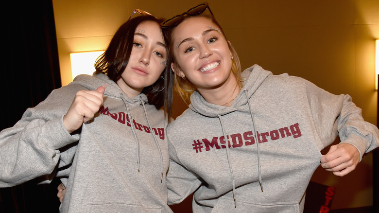 Miley and Noah Cyrus smiling