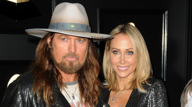 Billy Ray and Tish Cyrus at an event