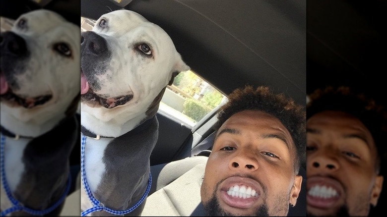 Odell Beckham Jr. posing with his dog, Tzar