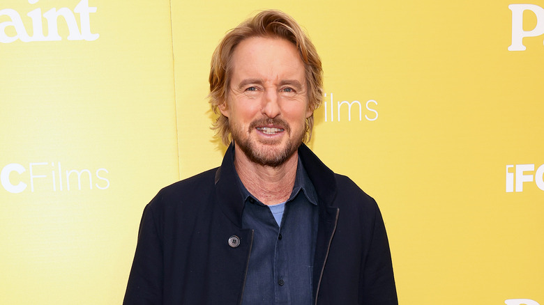 Owen Wilson poses for a photograph on red carpet