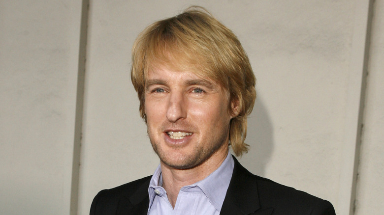 Owen Wilson smiles for a photo