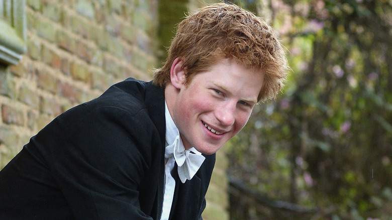 Prince Harry wearing a black jacket and white bow tie