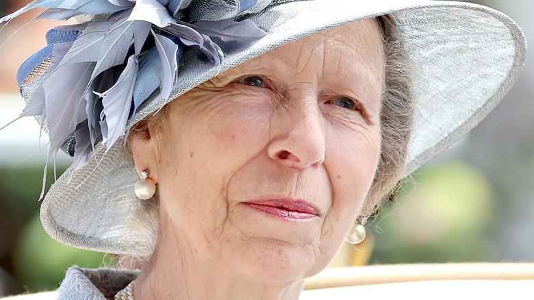 Princess Anne wearing a wide-brimmed hat