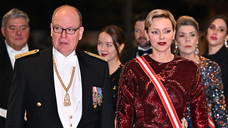 Prince Albert glasses, Princess Charlene red dress