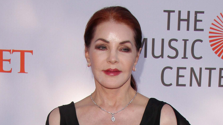 Priscilla Presley wearing silver necklace