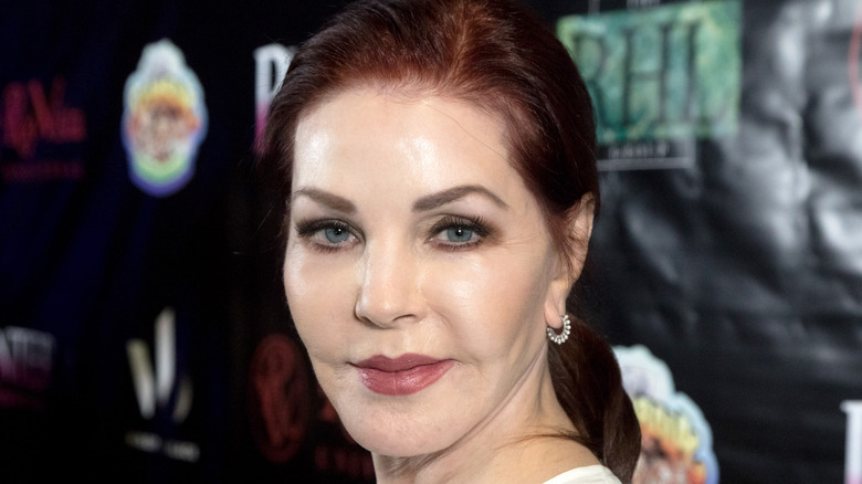 Priscilla Presley smiles