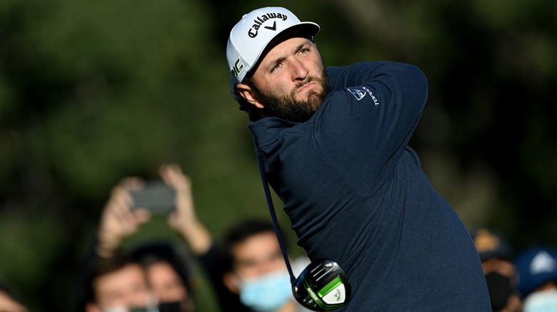 Jon Rahm teeing off