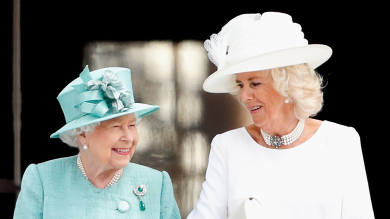 The Queen and Camilla Parker-Bowles at an event 