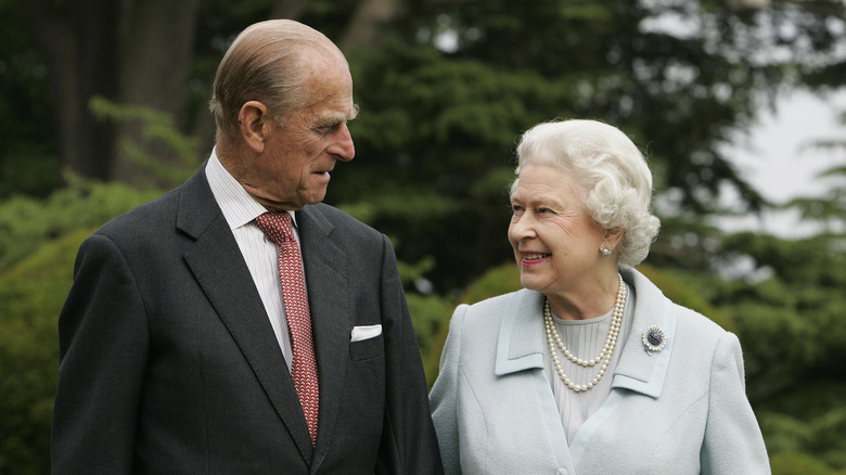 Queen Elizabeth and Prince Philip at an event 