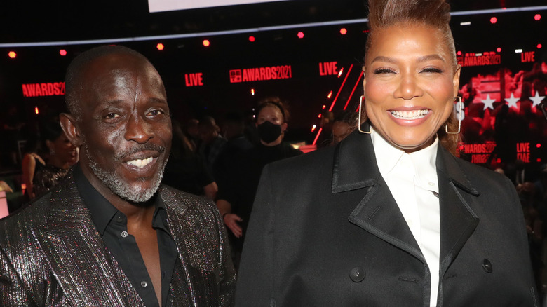 Queen Latifah and Michael K Williams laughing 