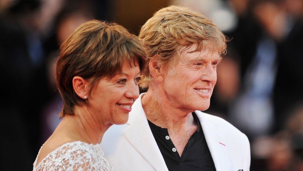 Robert Redford and Sibylle Szaggars on red carpet