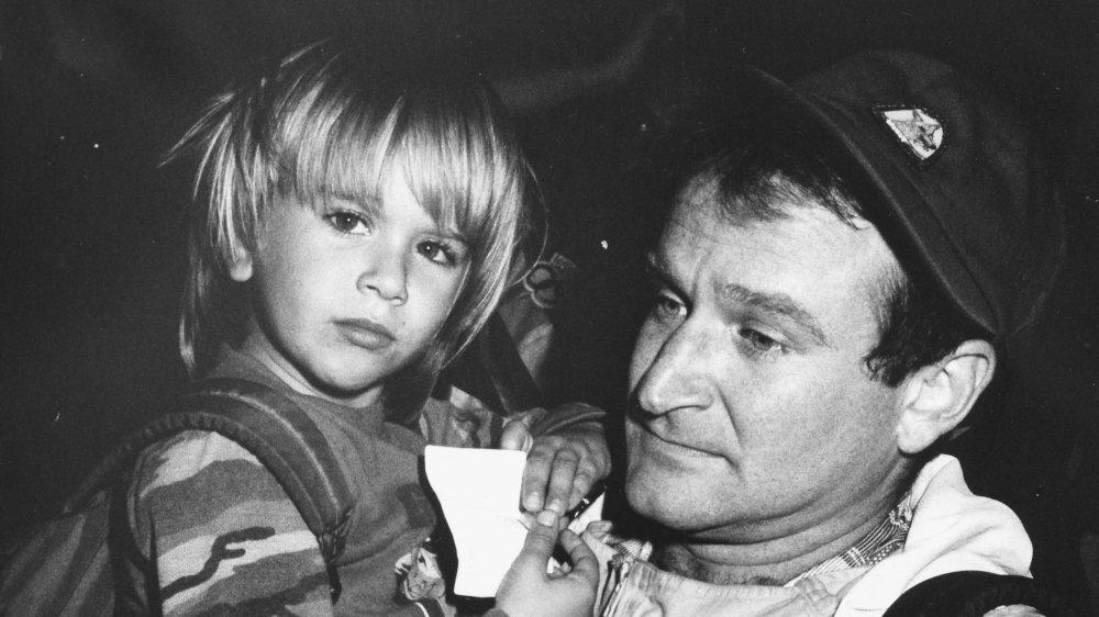 Robin Williams holding his son, Zak Williams