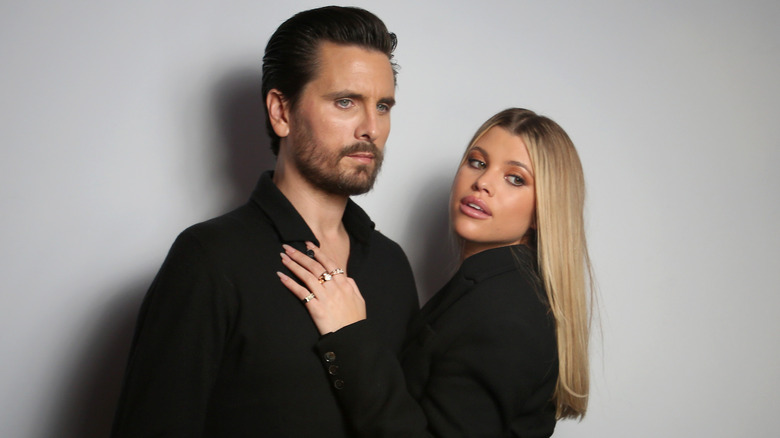 Scott Disick, Sofia Richie posing